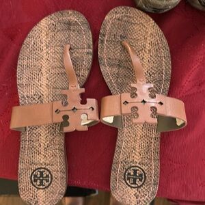 Tory Burch animal print flip flops size 6. Slightly worn